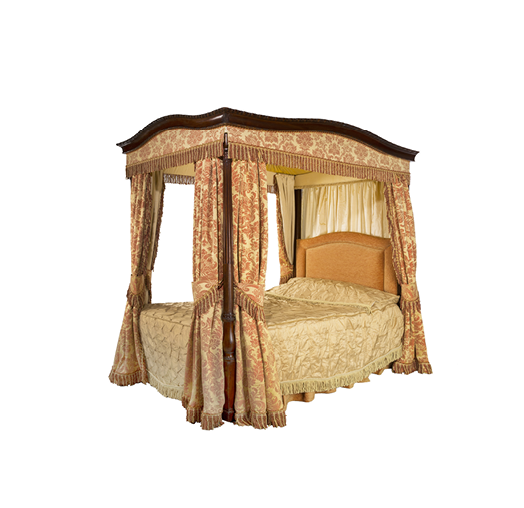 Old vintage four poster bed with drapes and curtains isolated on white with clipping path