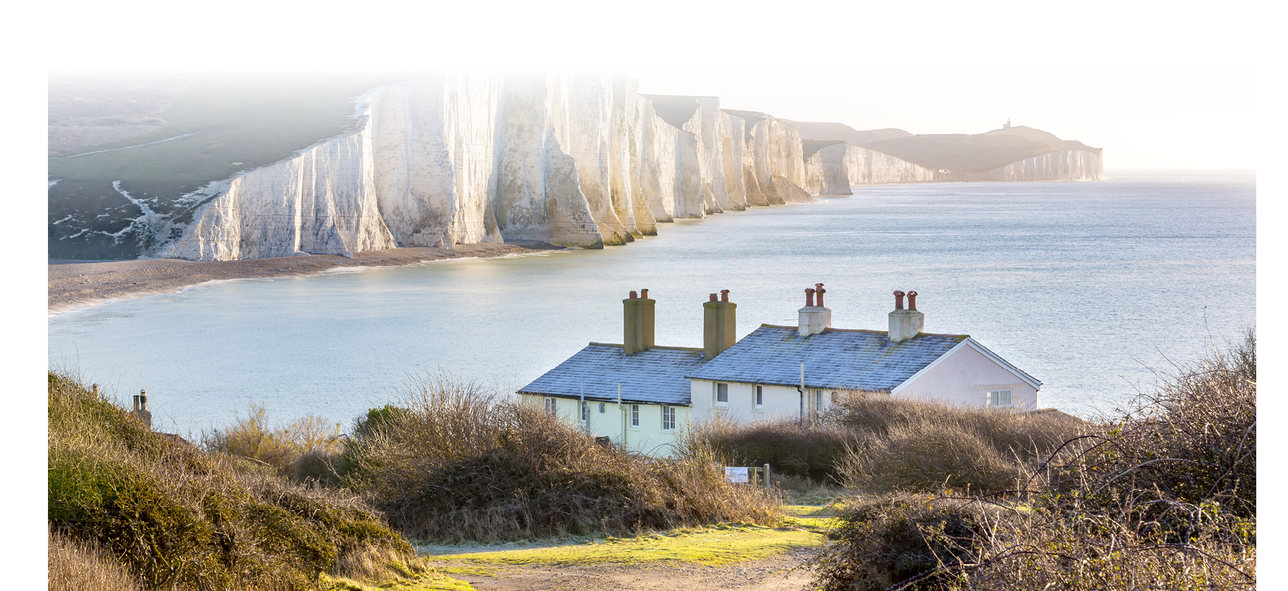 The Coast Guard Cottages and Seven Sisters Chalk Cliffs just outside Eastbourne, Sussex, England, UK