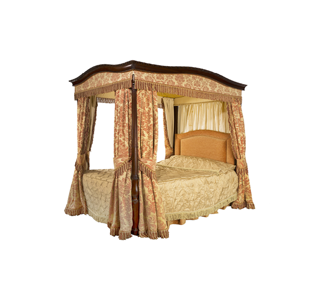 Old vintage four poster bed with drapes and curtains isolated on white with clipping path